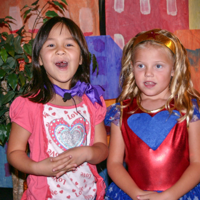 Young girls singing together